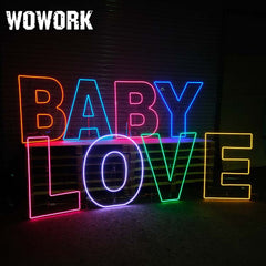 neon stand backdrop for baby birthday party