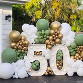 Custom large marquee numbers with bulb lighting at birthday event