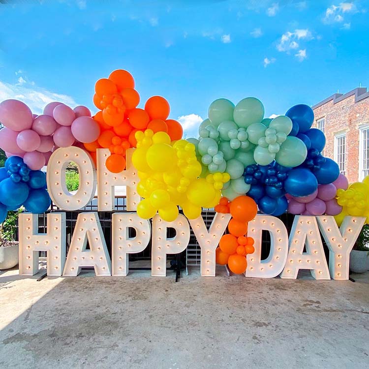 Warehouse team packing 4ft marquee letters for shipping